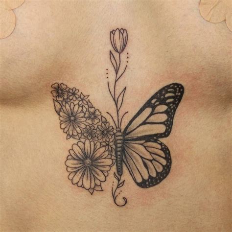 butterfly sternum tattoo